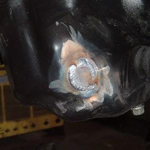 hole in oil pan.JPG